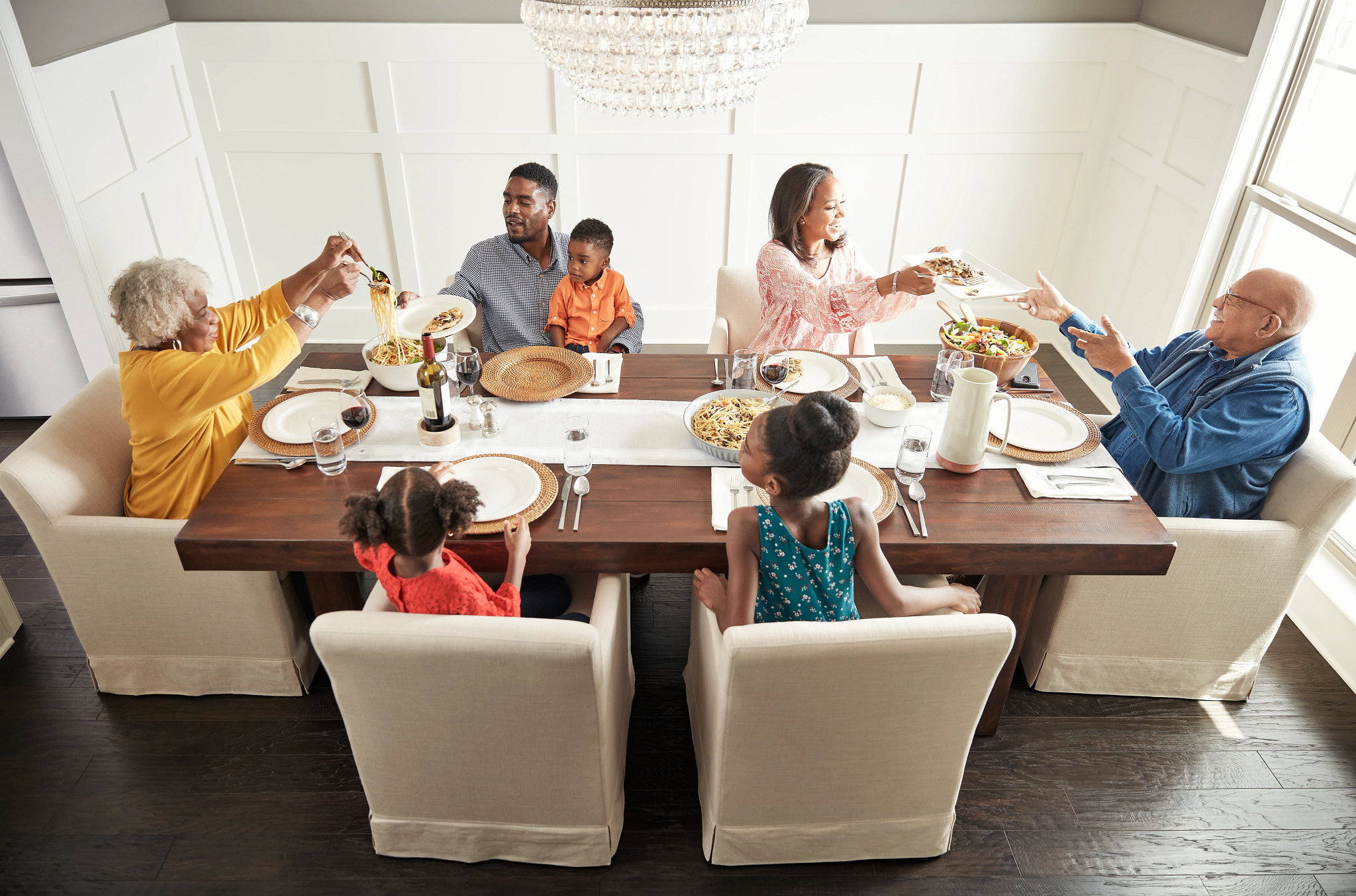 Family having breakfast at the dining table | Christian Brothers Flooring & Interiors