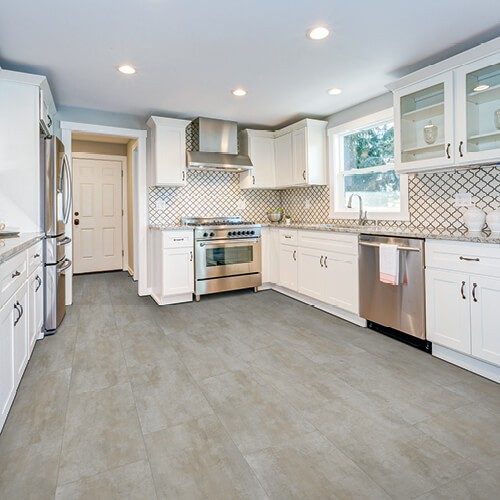 Tile look laminate flooring in kitchen