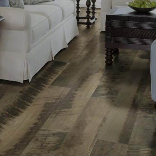 Dark wood-look laminate flooring in bedroom